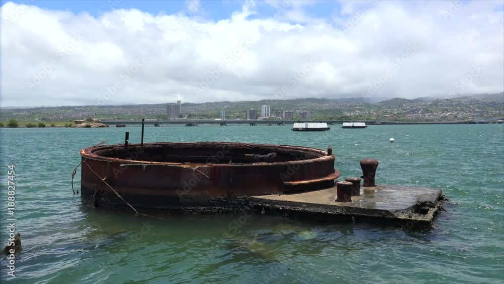 Remains of a sunken battleship above the surface of the water at USS Arizona Memorial. Pearl Harbor.Oahu, Hawaii, USA Remains of a sunken battleship above the surface of the water at USS Arizona Memorial. Pearl Harbor.Oahu, Hawaii, USA