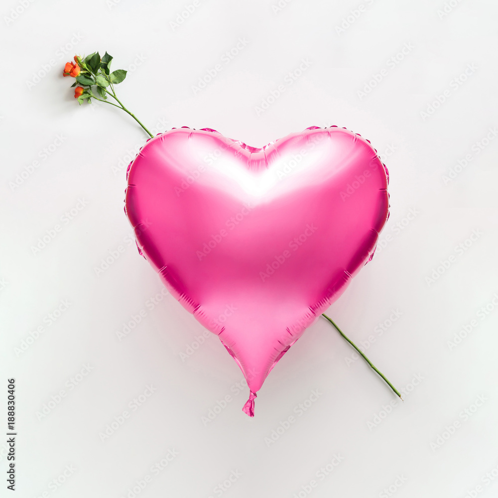 Pink heart balloon on bright background.Valentines day flat lay. Minimal love concept.