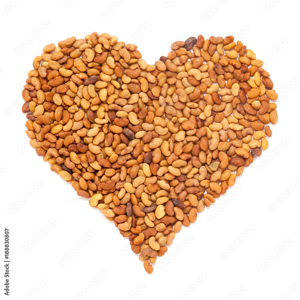 Organic Alfalfa seed (Medicago sativa) in Heart Shape. Isolated on White Background. Micro Closeup, Top view. Organic Alfalfa seed (Medicago sativa) in Heart Shape. Isolated on White Background. Micro Closeup, Top view.