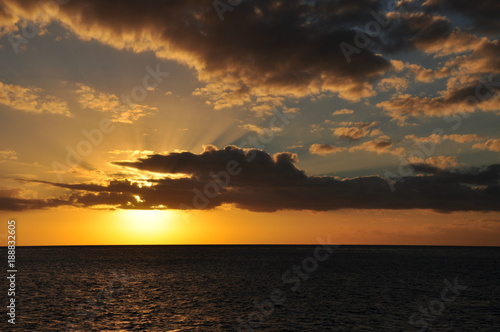The sun setting at sea on the Great Barrier Reef