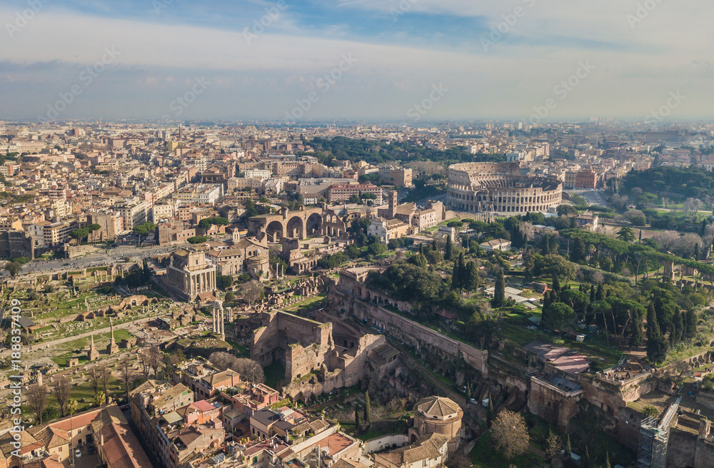 Obraz premium Cityscape of Rome. Aerial view of Colosseum and ancinet Roman ruins