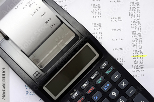 Accounting calculator and figures listing photo