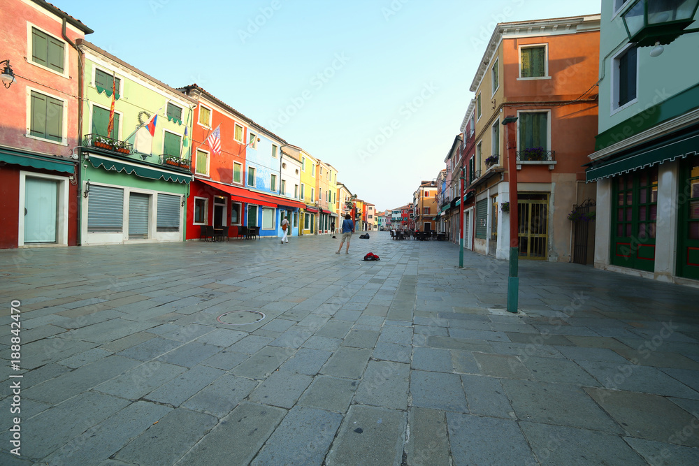 main street of Burano Island ITALY in the early morning