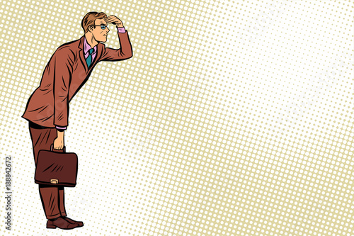 Businessman looking forward, watch