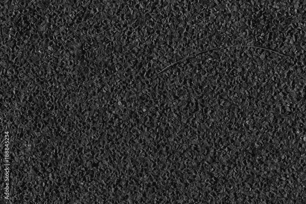 Fototapeta premium Monochrome Granite rock closeup background, stone texture, cracked surface