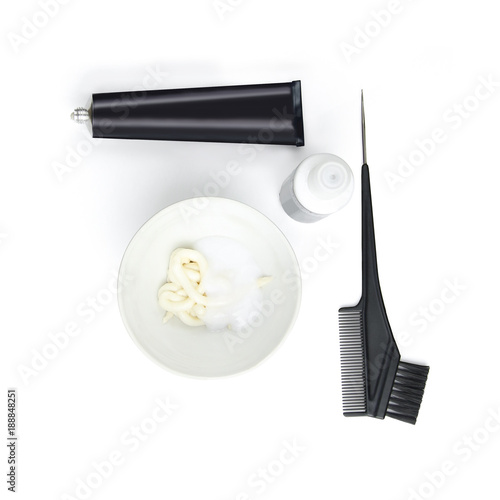 Hair coloring set with hair dye, paintbrush, hairbrush, paint containers on white background, for home hair coloring