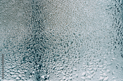 water drops on glass, window with condensation, close-up