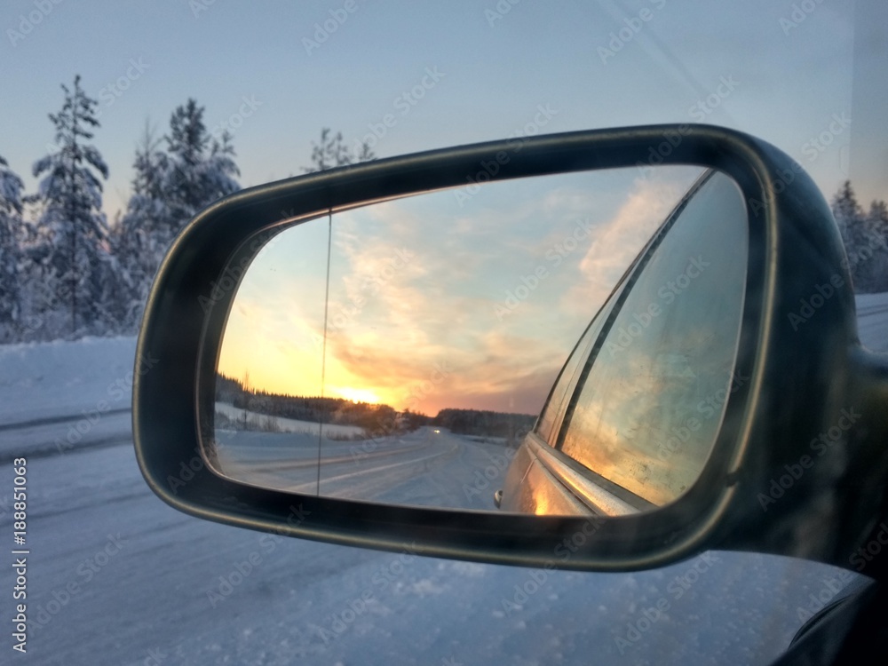 Reflection in car's mirror