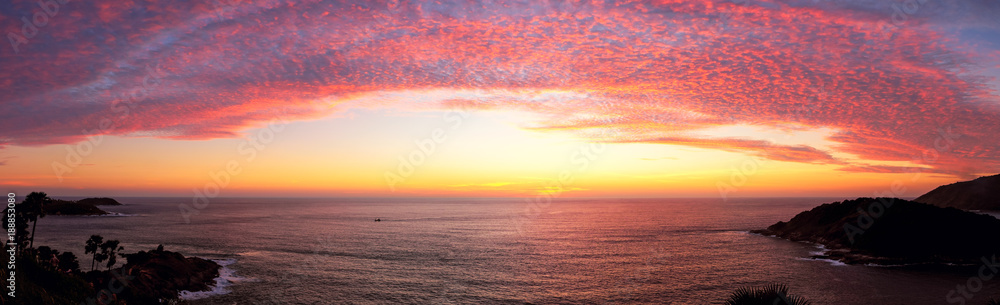 Panorama view point - Phromthep cape with cirrostratus cloud and dramatic sunset sky, Phuket Island, Thailand.