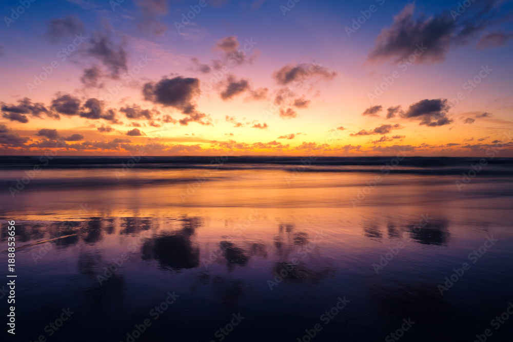Beautiful sunset  with long exposure effect, motion blurred at Bang Tao Beach, Phuket Island, Thailand.