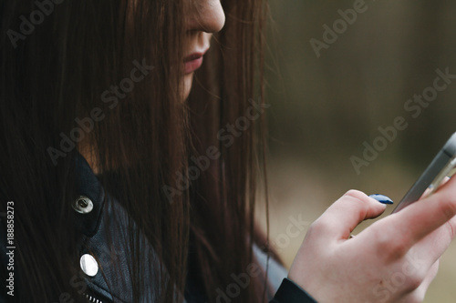 Young woman using a handheld mobile phone