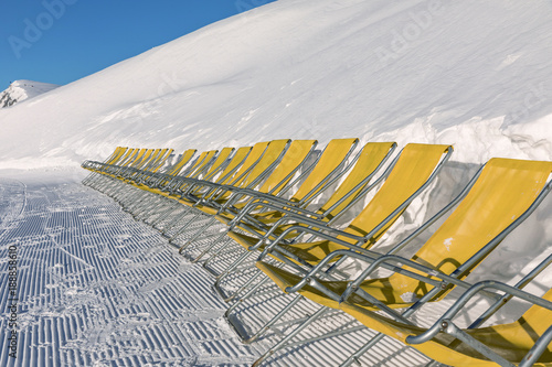 Dolomites, ski area with beautiful slopes. Empty ski slope in winter on a sunny day. Prepared piste and sunny day photo