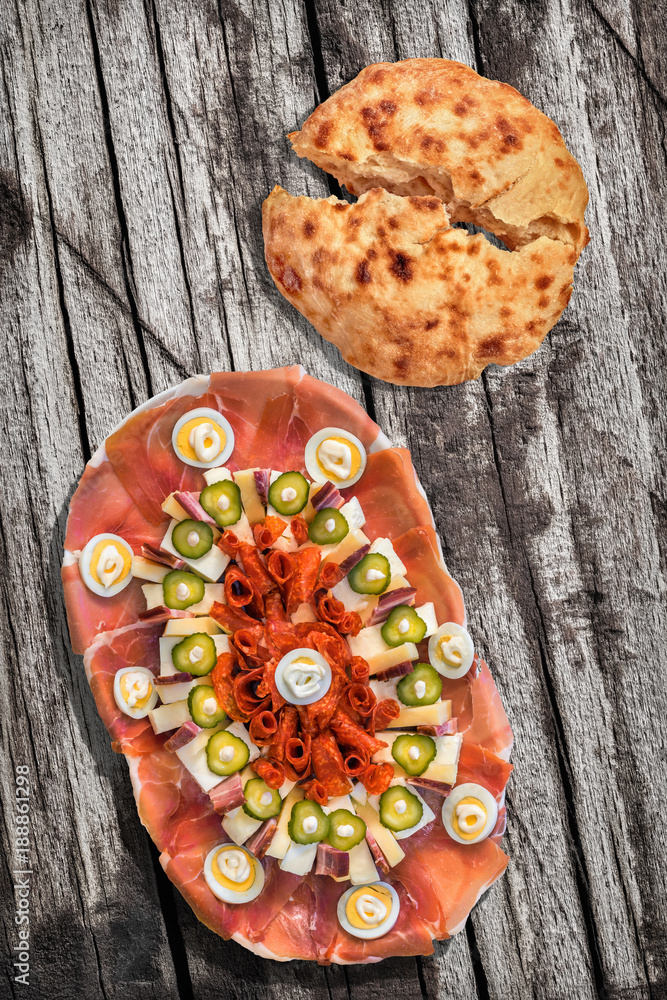 Traditional Serbian Welcome Appetizer Savory Dish Meze And Fireplace Baked Leavened Pitta Flatbread Torn Loaf Set On Old Weathered Cracked Pinewood Picnic Table