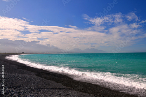 Kaikoura beach with black pebbles © Lada