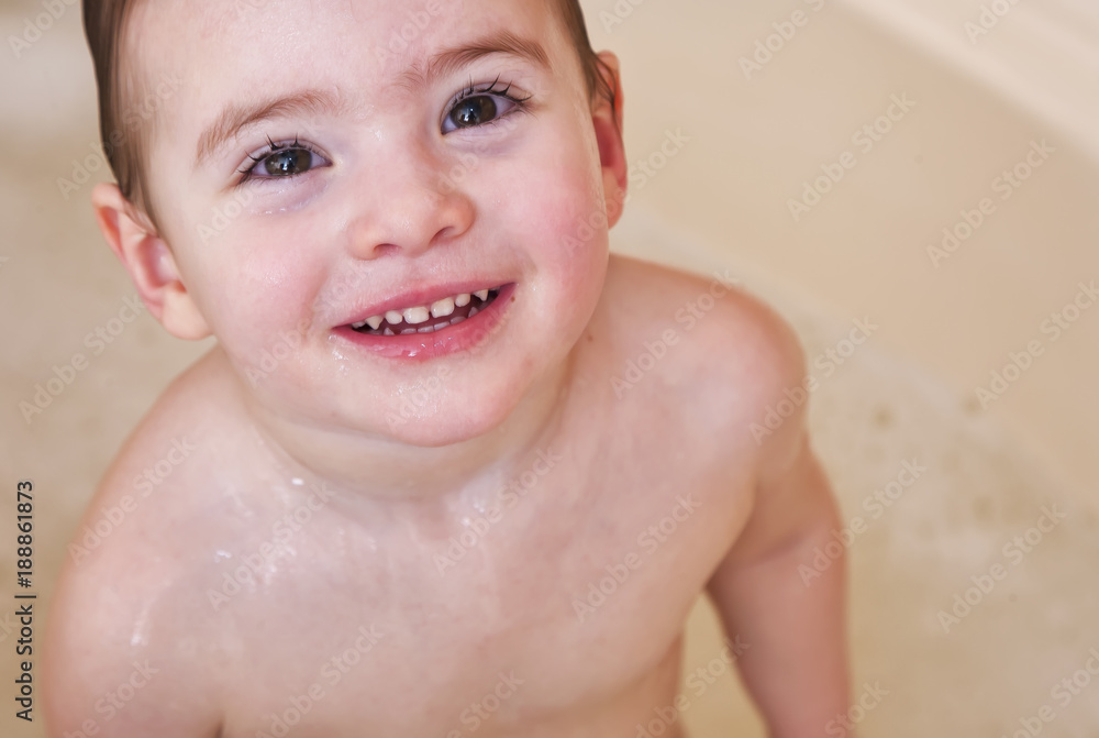 happy girl laughing and bathed in the bath happy girl laughing and bathed in the bath