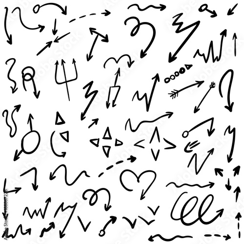 Arrow doodles vector. A set of simple sketches of arrows. Up, down, left, right ones. The effect of a pencil sketch isolated on white background.. Vector eps 10.