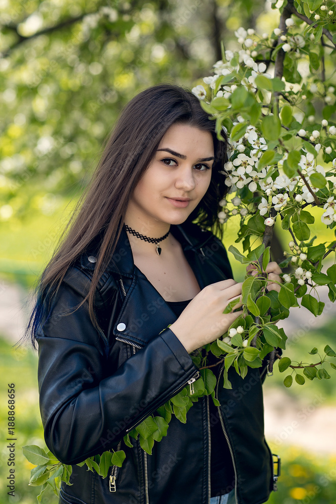 Glamorous young caucasian woman in black leather jacket Glamorous young caucasian woman in black leather jacket