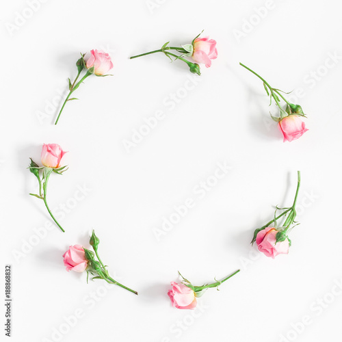 Flowers composition. Wreath made of pink rose flowers on white background. Flat lay, top view, copy space