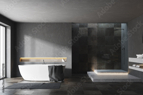 Black and tiled bathroom interior