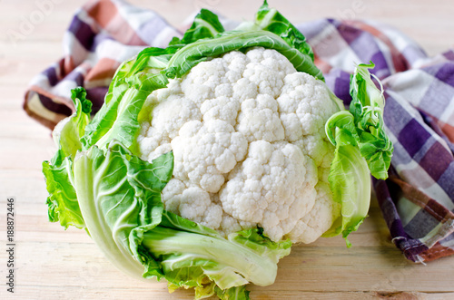 Fresh cauliflower on a wooden table