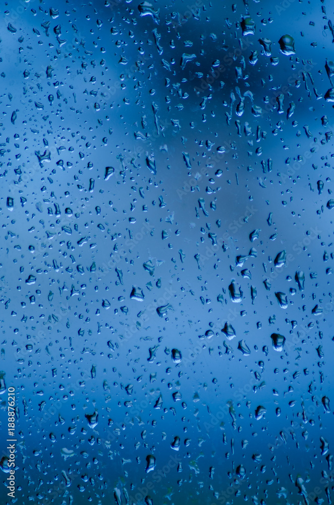 Wet glass texture. Raindrops. Close up. Macro.