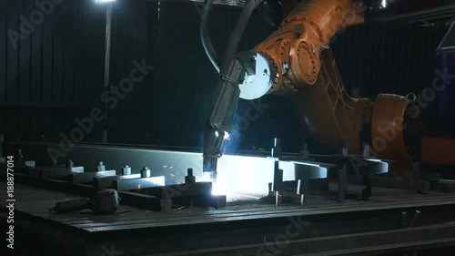 Timelapse of welding robot arm melt metal process at workshop. High Precision Modern Tools in Heavy Industry. Automatic work. Technology and Industrial Concept. Shot in 5K RAW