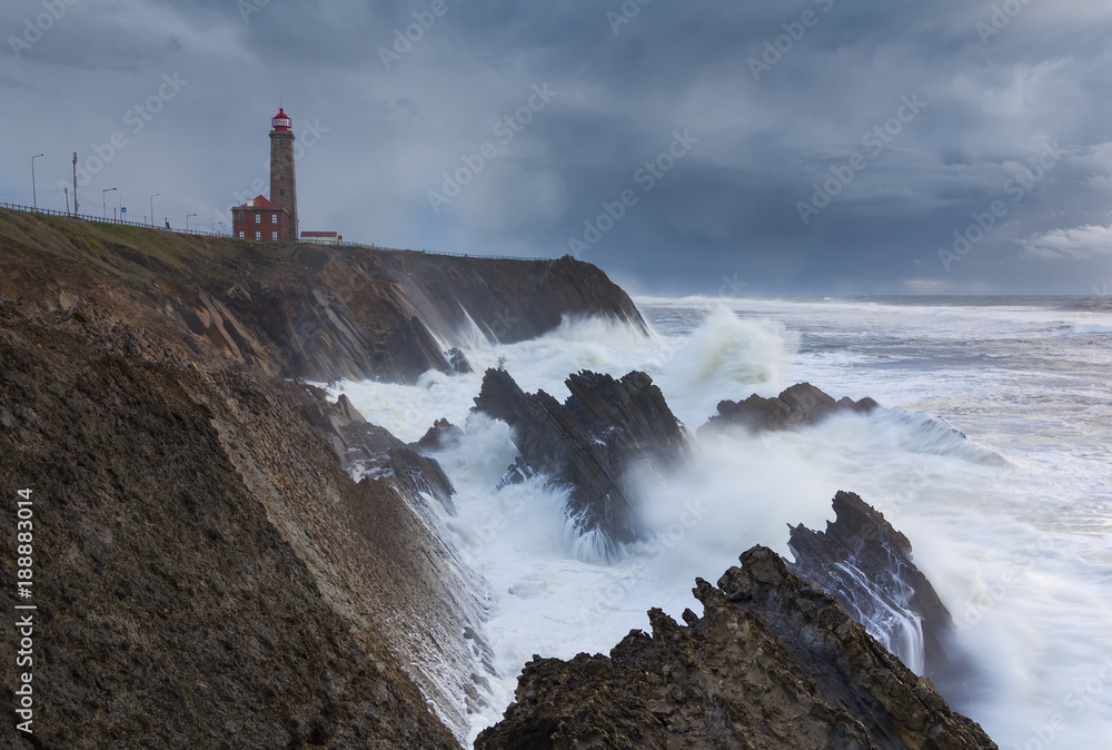 Stormy sea and lighthouse