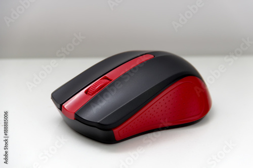 computer mouse, red color for professional gamers on a white background.