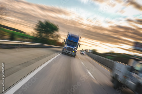 Motion blur semi truck 18 wheeler photo