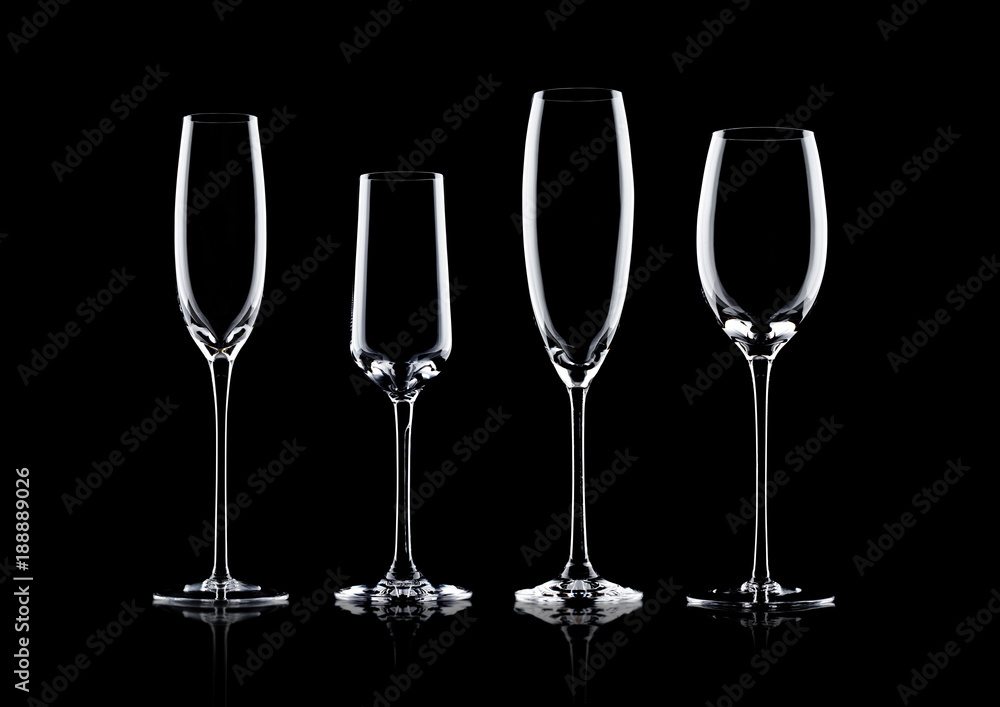 Empty champagne glasses on black background