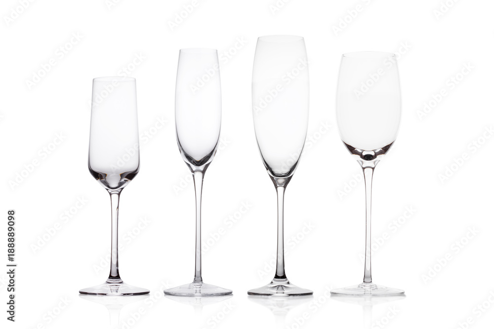 Empty champagne glasses on white background