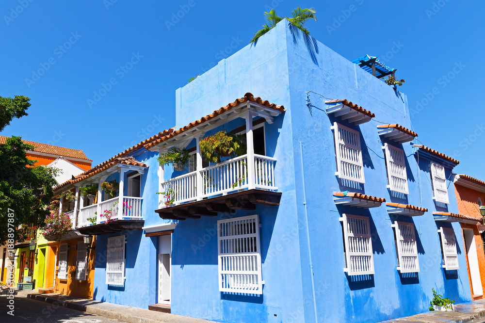Colorful colonial buildings in Cartagena walled city, Colombia. Beautiful historic buildings with balconies.
