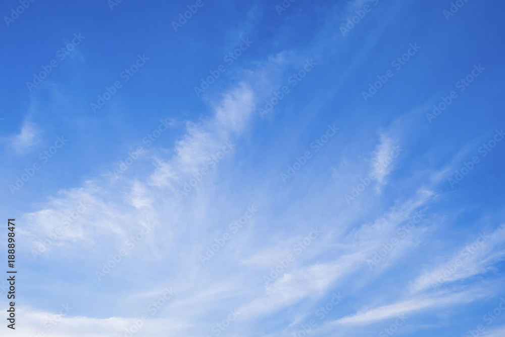 Fototapeta premium Pink sky background with white clouds.