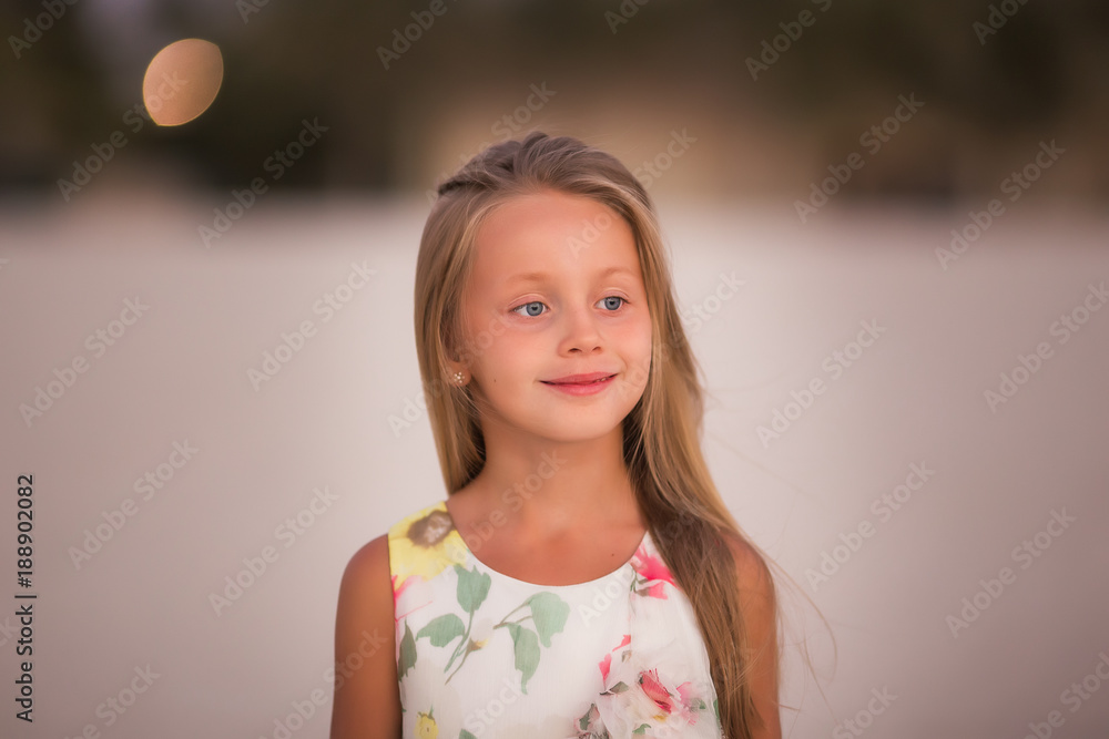 Portait of a handsome little girl in the holiday Portait of a handsome little girl in the holiday