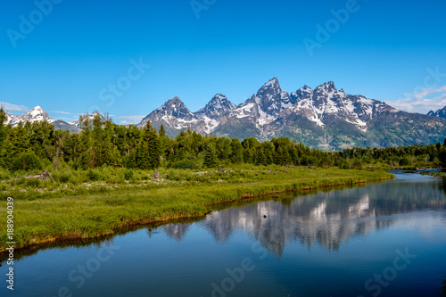 Mountains in Grand Teton National Park with reflection in Snake River © haveseen