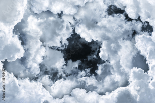 Fototapeta Naklejka Na Ścianę i Meble -  circle white clouds layer as frame with black sky background