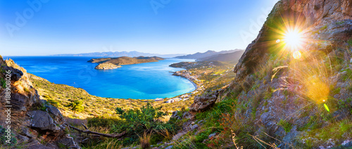 Panoramic view of the gulf of Elounda with Spinalonga island. View from the mountain through a cave, Crete, Greece. photo