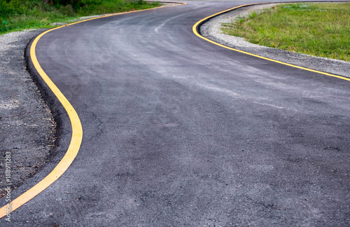 Black asphalt road curved © Mumemories