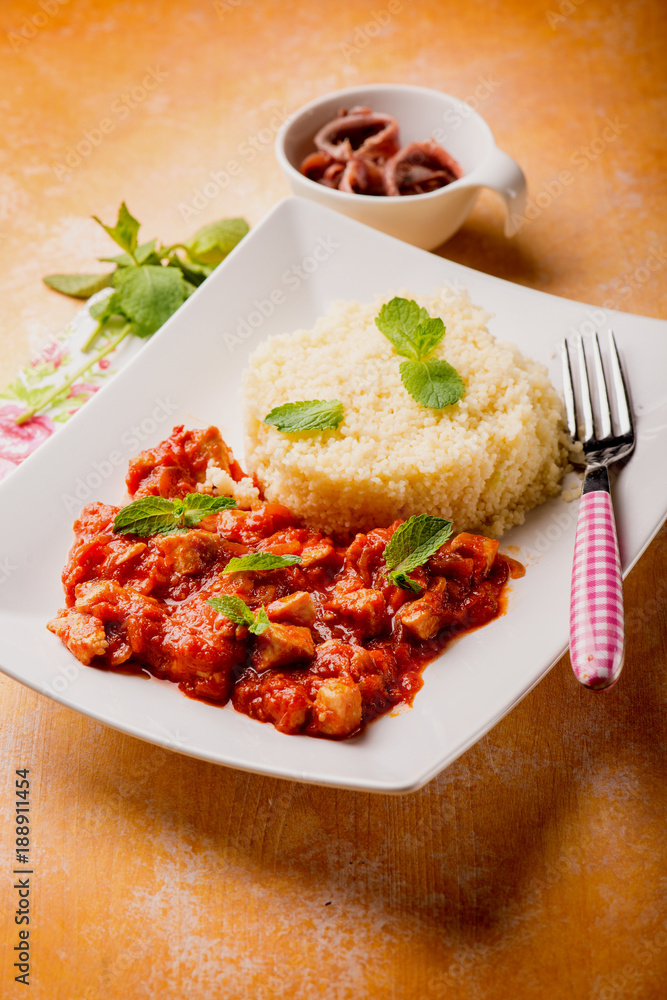 couscous with stew fish, selective focus couscous with stew fish, selective focus