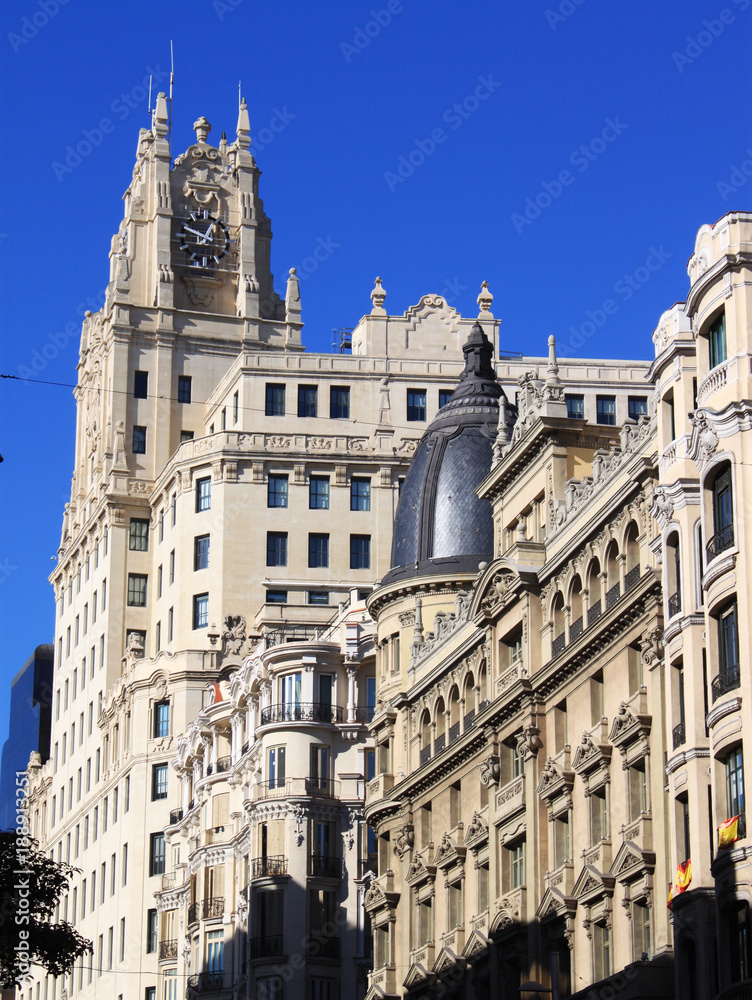 Luxury buildings on the famous avenue of Gran Via in Madrid, Spain