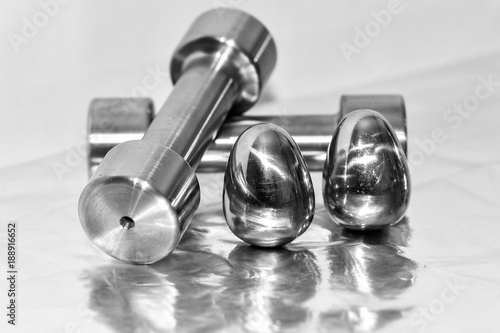 Metal dumbbells and steel eggs, the concept of sports training a