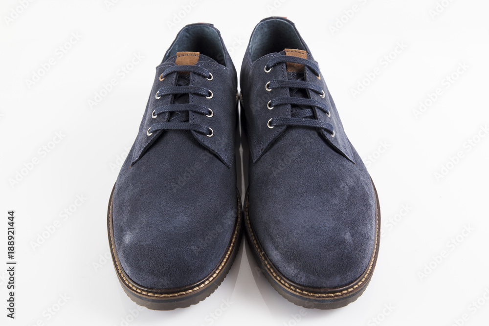 Male blue leather shoe on white background, isolated product, comfortable footwear. Male blue leather shoe on white background, isolated product, comfortable footwear.
