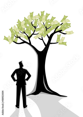 Businessman looking at money tree