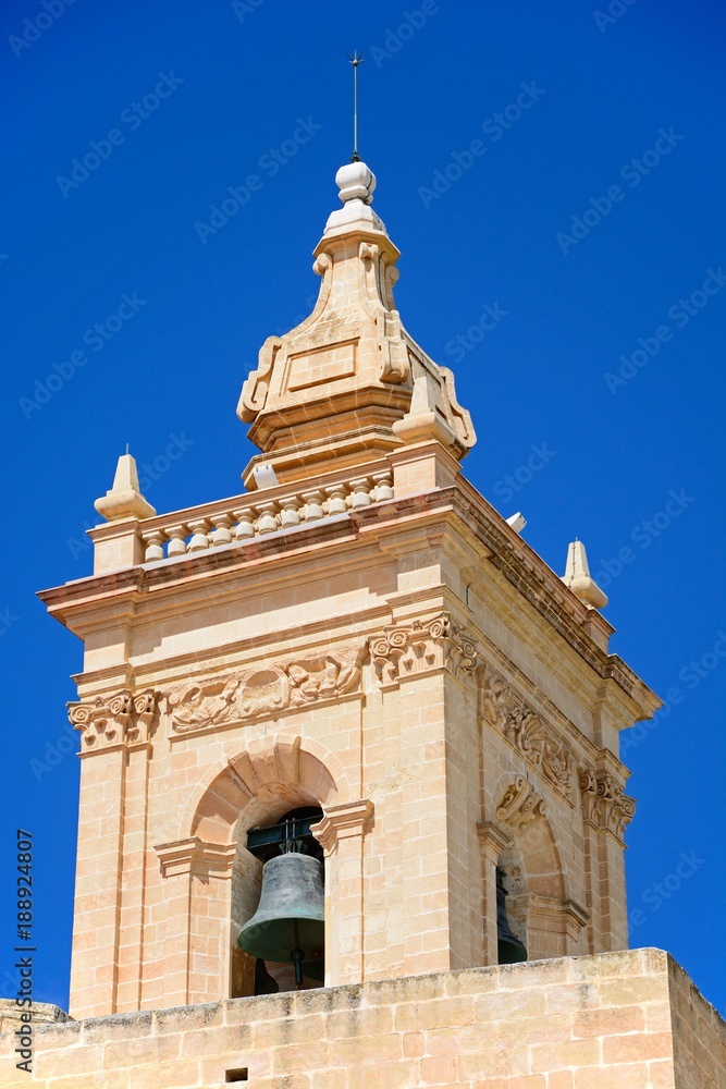 Obraz premium View of the Cathedral bell tower within the citadel, Rabat, Gozo, Malta.