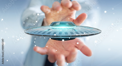 Fototapeta Naklejka Na Ścianę i Meble -  Businessman with retro UFO spaceship 3D rendering