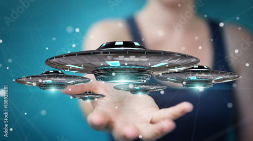 Fototapeta Naklejka Na Ścianę i Meble -  Businesswoman with retro UFO spaceship 3D rendering