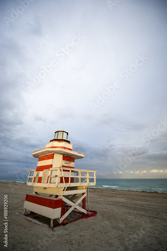 Lonely lifeguard tower on empty beach on a cloudy afternoon in Miami, Florida
