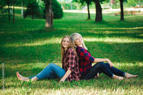 Two friends smiling outside