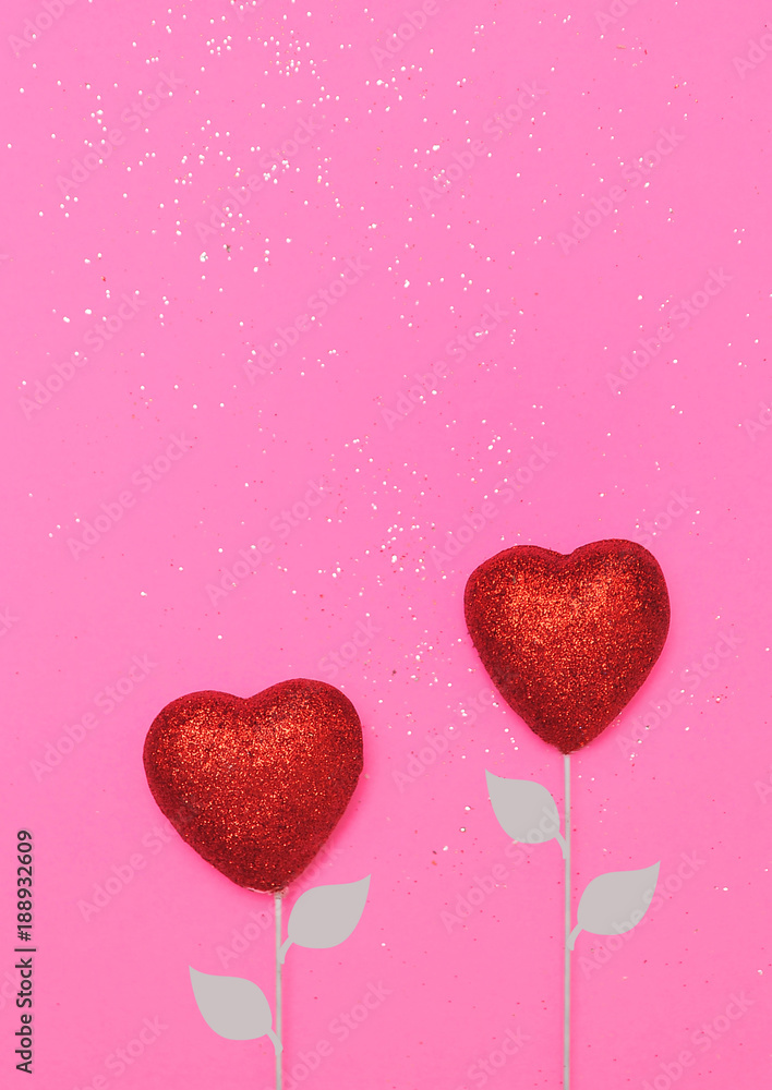 Two red hearts on a black background

