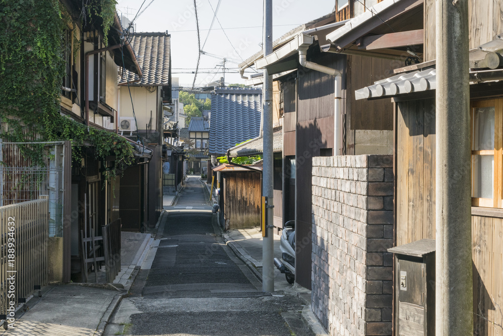 Historical residential area with old traditional houses  in downtown Kyoto, Japan